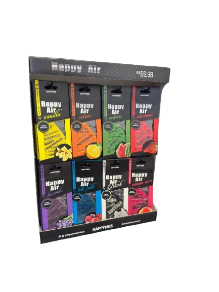 Display of Happy Air flavored products in colorful packaging including vanilla, citrus, watermelon, strawberry, lavender, blue fruits, black espresso, and mango com flavors.